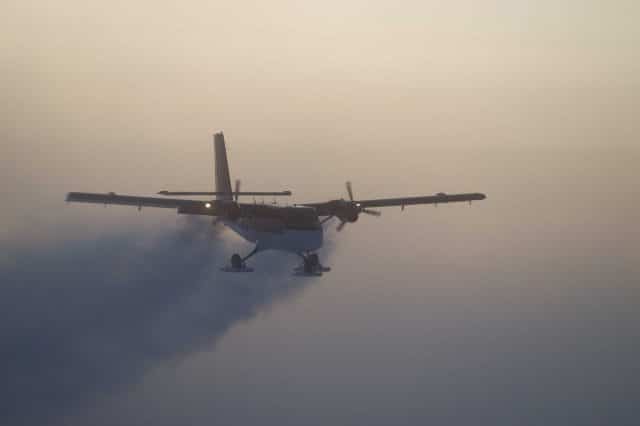 This 2003 photo by Jason Medley, NSF,  shows the Twin Otter departing the South Pole on a second medical flight