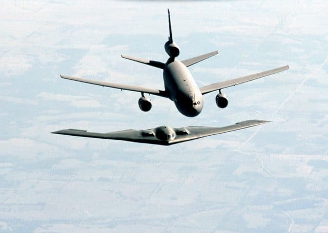 A B-2 Spirit Bomber aircraft on approach to aerial refueling from a US Air Force KC-10A Extender Aircraft from McGuire AFB, New Jersey during a training exercise.